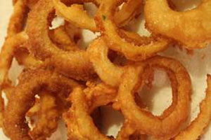 picture of a plate filled with onion rings