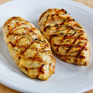 picture of two chicken breasts grilled