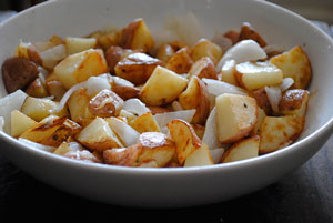 picture of diced potatoes with onions cooked